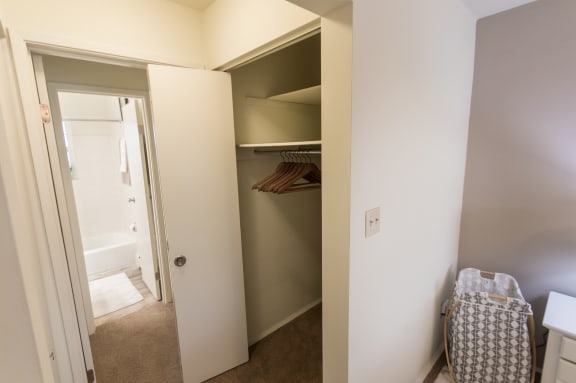 This is a photo of one of the large closets in the bedroom of the 1 bedroom, 631 square foot model apartment at Lake of the Woods Apartments in Cincinnati, OH.