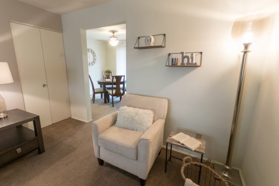 This is a photo of the living room of the 1 bedroom, 631 square foot model apartment at Lake of the Woods Apartments in Cincinnati, OH.