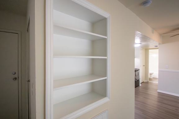 This is a photo of the living room built-in bookshelf of the 560 square foot 1 bedroom, 1 bath Elm floor plan at Montana Valley Apartments in Cincinnati, OH.