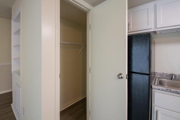 This is a photo of the living room/kitchen closet of the 560 square foot 1 bedroom, 1 bath Elm floor plan at Montana Valley Apartments in Cincinnati, OH.