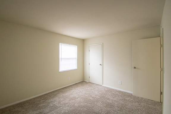 This is a photo of the bedroom of the 560 square foot 1 bedroom, 1 bath Elm floor plan at Montana Valley Apartments in Cincinnati, OH.