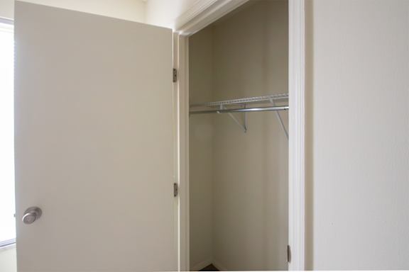 This is a photo of the bedroom closet of the 560 square foot 1 bedroom, 1 bath Elm floor plan at Montana Valley Apartments in Cincinnati, OH.