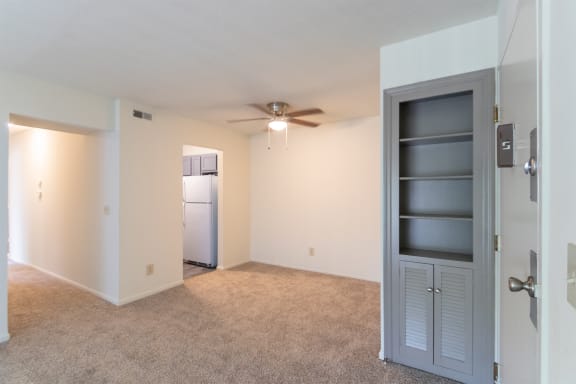 This is a photo the dining area and built-in shelving of the 940 square foot, Sycamore 2 bedroom, 1 bath apartment at Montana Valley Apartments in the Westwood neighborhood of Cincinnati, OH.