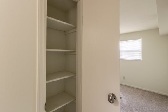 This is a photo the hall linen closet of the 1030 square foot, Oak 2 bedroom, 1 bath apartment at Montana Valley Apartments in the Westwood neighborhood of Cincinnati, OH.