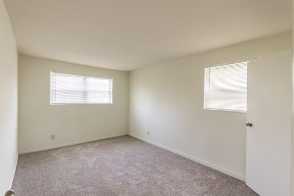 This is a photo the primary bedroom of the 1030 square foot, Oak 2 bedroom, 1 bath apartment at Montana Valley Apartments in the Westwood neighborhood of Cincinnati, OH.