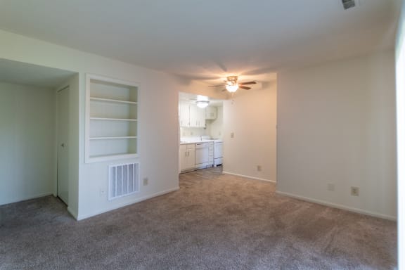 This is a photo of the living room with built-in bookshelf of a 500 square foot 1 bedroom, 1 bath Cedar at Montana Valley Apartments in Cincinnati, OH.