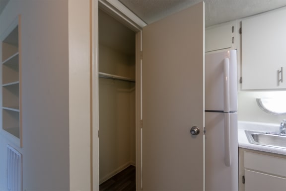 This is a photo of the living room/kitchen closet of a 500 square foot 1 bedroom, 1 bath Cedar at Montana Valley Apartments in Cincinnati, OH.