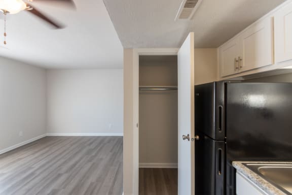 This is a photo of the living room/kitchen closet in an upgraded 500 square foot 1 bedroom, 1 bath Cedar floor plan at Montana Valley Apartments in Cincinnati, OH.