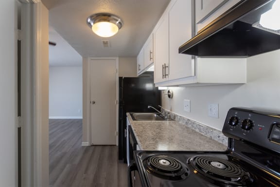 This is a photo of the kitchen in an upgraded 500 square foot 1 bedroom, 1 bath Cedar floor plan at Montana Valley Apartments in Cincinnati, OH.