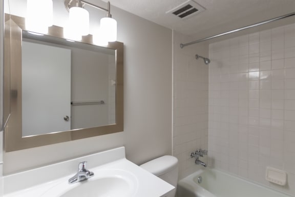 This is a photo of the bathroom in an upgraded 500 square foot 1 bedroom, 1 bath Cedar floor plan at Montana Valley Apartments in Cincinnati, OH.