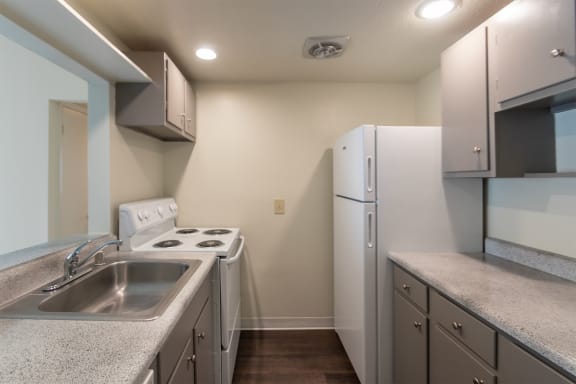 This is a photo the kitchen of the 833 square foot Chestnut, 2 bedroom apartment at Montana Valley Apartments in Cincinnati, OH.