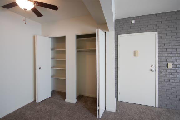 This is a photo the dining room pantry/closet and coat closet in the 833 square foot Chestnut, 2 bedroom apartment at Montana Valley Apartments in Cincinnati, OH.