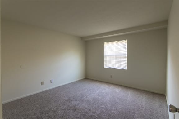 This is a photo of the bedroom of the 716 square foot 1 bedroom, 1 bath Cypress floor plan at Montana Valley Apartments in Cincinnati, OH.