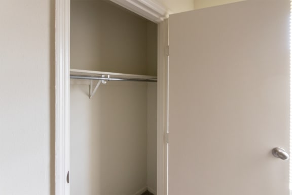 This is a photo of the bedroom closet of the 560 square foot 1 bedroom, 1 bath Elm floor pla at Montana Valley Apartments in Cincinnati, OH.