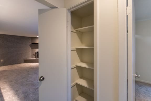 This is a photo the hallway linen closet of the 925 square foot, Hazelnut 2 bedroom, 1 bath apartment at Montana Valley Apartments in the Westwood neighborhood of Cincinnati, OH.