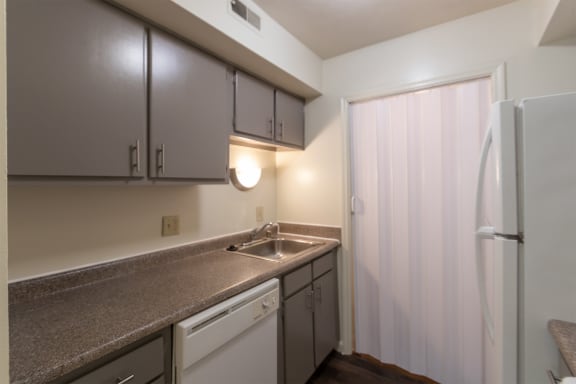 This is a photo of the kitchen of the 836 square foot 2 bedroom, 1 bath Hickory floor plan at Montana Valley Apartments in Cincinnati, OH.