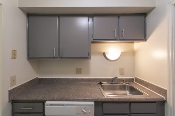 This is a photo of the kitchen of the 836 square foot 2 bedroom, 1 bath Hickory floor plan at Montana Valley Apartments in Cincinnati, OH.