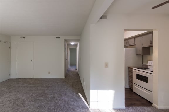 This is a photo of the living room and hallway of the 836 square foot 2 bedroom, 1 bath Hickory floor plan at Montana Valley Apartments in Cincinnati, OH.