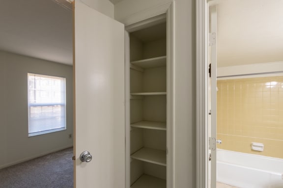 This is a photo of the hallway linen closetof the 836 square foot 2 bedroom, 1 bath Hickory floor plan at Montana Valley Apartments in Cincinnati, OH.