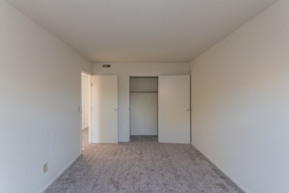 This is a photo of the primary bedroom of the 836 square foot 2 bedroom, 1 bath Hickory floor plan at Montana Valley Apartments in Cincinnati, OH.