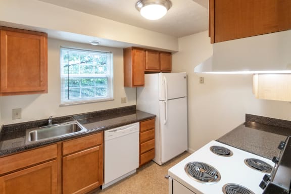 This is a photo the kitchen of the 851 square foot, Maple 2 bedroom, 1 bath apartment at Montana Valley Apartments in the Westwood neighborhood of Cincinnati, OH.