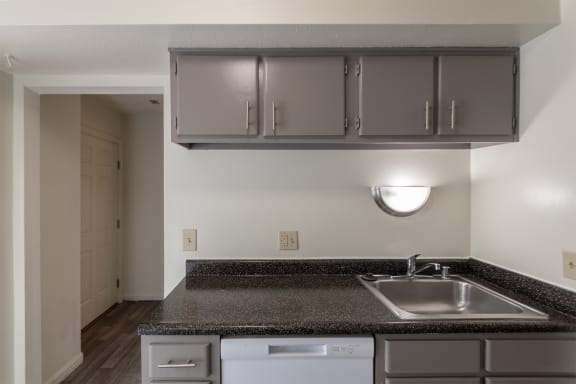 This is a photo of the kitchen of the 1310 square foot 3 bedroom, 1.5 bath Pine floor plan at Montana Valley Apartments in Cincinnati, OH.