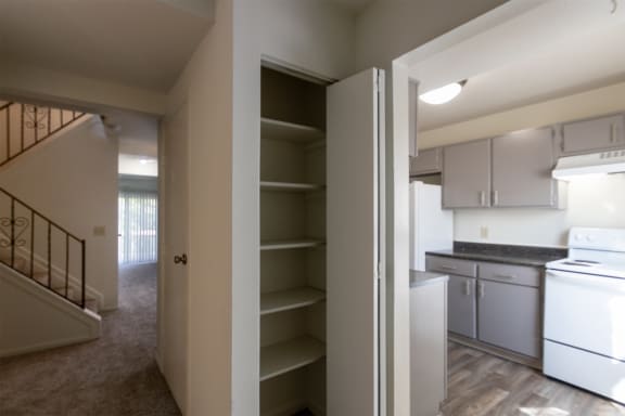 This is a photo of the entryway linen closet/pantry of the 1310 square foot 3 bedroom, 1.5 bath Pine floor plan at Montana Valley Apartments in Cincinnati, OH.