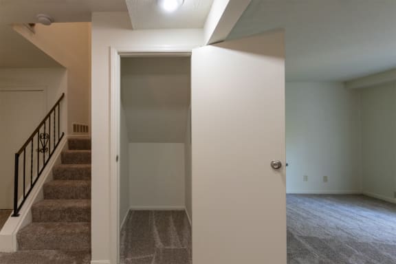 This is a photo of the under stairs closet of the 1310 square foot 3 bedroom, 1.5 bath Pine floor plan at Montana Valley Apartments in Cincinnati, OH.