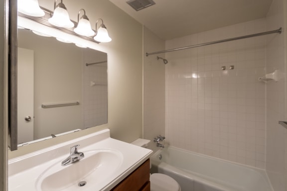 This is a photo of the bathroom of the 1310 square foot 3 bedroom, 1.5 bath Pine floor plan at Montana Valley Apartments in Cincinnati, OH.