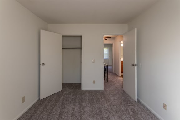 This is a photo of one of the 2 9.5 feet by 10 feet 2 inch (right) bedrooms of the 1310 square foot 3 bedroom, 1.5 bath Pine floor plan at Montana Valley Apartments in Cincinnati, OH.