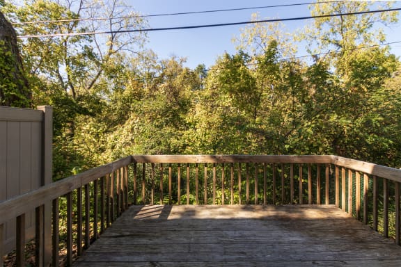 This is a photo of the private back deck of the 1310 square foot 3 bedroom, 1.5 bath Pine floor plan at Montana Valley Apartments in Cincinnati, OH.