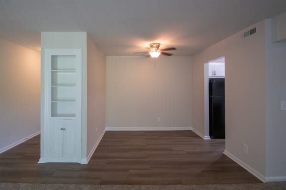 This is a photo the built-in bookshelf and dining area of an upgraded 1030 square foot, Oak 2 bedroom, 1 bath apartment at Montana Valley Apartments in the Westwood neighborhood of Cincinnati, OH.