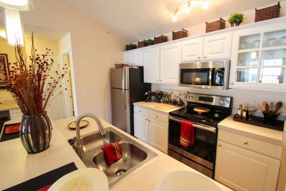 This is a photo of the kitchen in the 2 bedroom Atlantic floor plan at Nantucket Apartments in Loveland, OH.