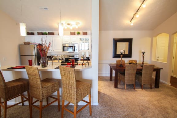 This is a photo of the kitchen/dining room in the 2 bedroom Atlantic floor plan at Nantucket Apartments in Loveland, OH.