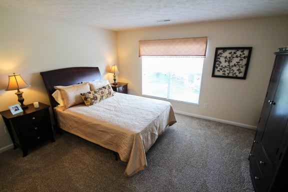 This is a photo of the master bedroom in the 2 bedroom Atlantic floor plan at Nantucket Apartments in Loveland, OH.