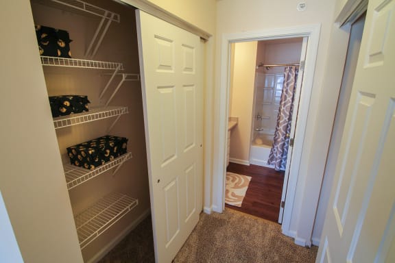 This is a photo of the primary bedroom hall closets in the 1242 square foot, 2 bedroom Atlantic floor plan at Nantucket Apartments in Loveland, OH.