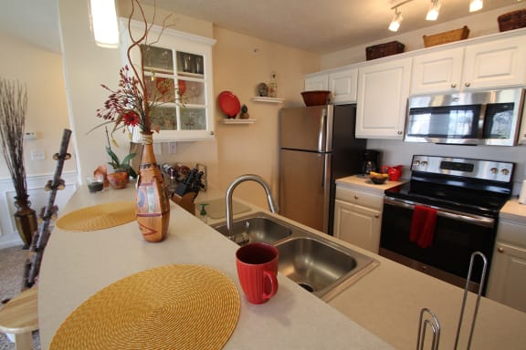 This is a photo of the kitchen in the 1 bedroom Clipper floor plan at Nantucket Apartments in Loveland, OH.