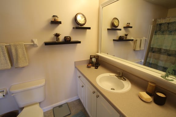 This is a photo of the bathroom in the 1 bedroom Clipper floor plan at Nantucket Apartments in Loveland, OH.
