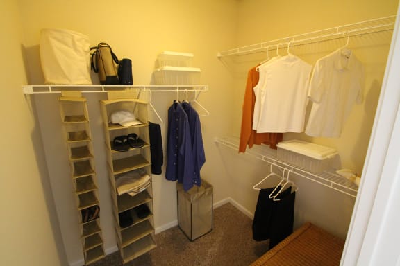 This is a photo of the walk-in closet of the master bedroom in the 2 bedroom Islander floor plan at Nantucket Apartments in Loveland, OH.