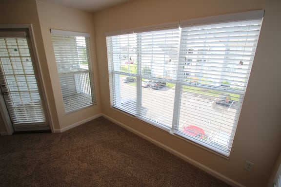 This is a photo of the living room in the 1 bedroom Patriot floor plan at Nantucket Apartments in Loveland, OH.