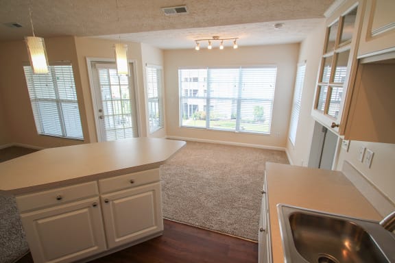 This is a photo looking towards teh dining area from the kitchen in the 1 bedroom Patriot floor plan at Nantucket Apartments in Loveland, OH.