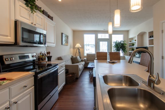 This is a photo of the kitchen in the 1242 square foot, 2 bedroom Spinnaker floor plan at Nantucket Apartments in Loveland, OH.