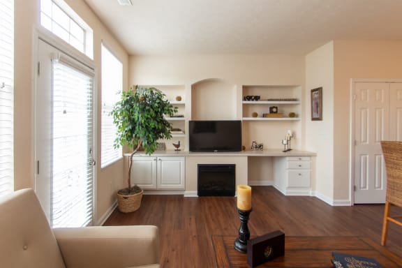 This is a photo of the living room in the 1242 square foot, 2 bedroom Spinnaker floor plan at Nantucket Apartments in Loveland, OH.