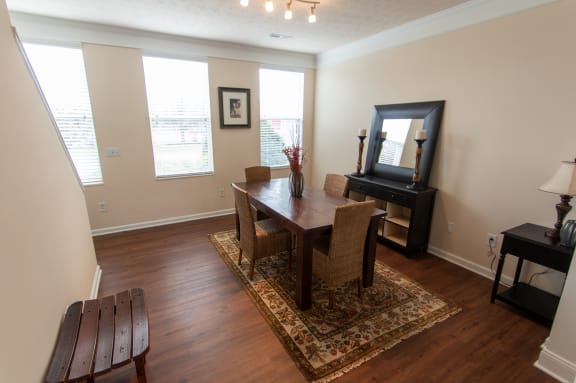 This is a photo of the dining room in the 1242 square foot, 2 bedroom Spinnaker floor plan at Nantucket Apartments in Loveland, OH.