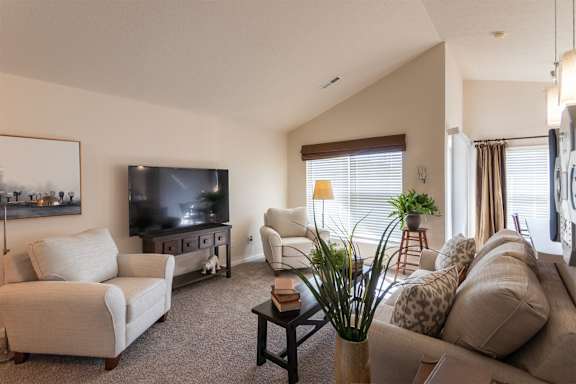 This is a photo of the living room in the 1016 square foot, 2 bedroom, 2 bath Nautica floor plan at Nantucket Apartments in Loveland, OH.