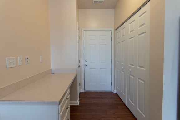 This is a photo of the closet with full-size washer/dryer connections and pantry in the 1578 square foot, 3 bedroom Flagship floor plan at Nantucket Apartments in Loveland, OH.