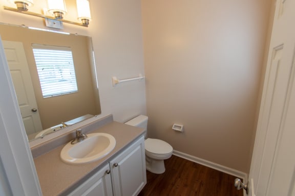 This is a photo of the half bath in the 1578 square foot, 3 bedroom, 2 and 1/2 bath Flagship floor plan at Nantucket Apartments in Loveland, OH.