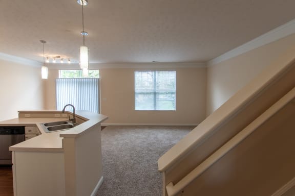 This is a photo of the living room in the 1578 square foot, 3 bedroom, 2 and 1/2 bath Flagship floor plan at Nantucket Apartments in Loveland, OH.