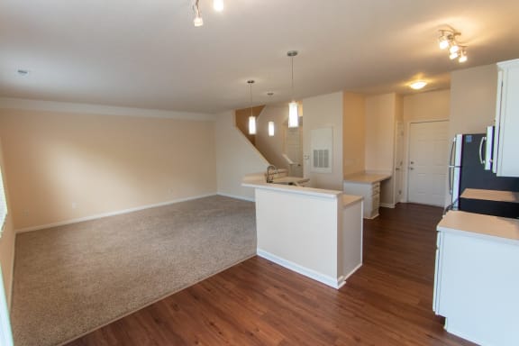 This is a photo of the living room in the 1578 square foot, 3 bedroom, 2 and 1/2 bath Flagship floor plan at Nantucket Apartments in Loveland, OH.