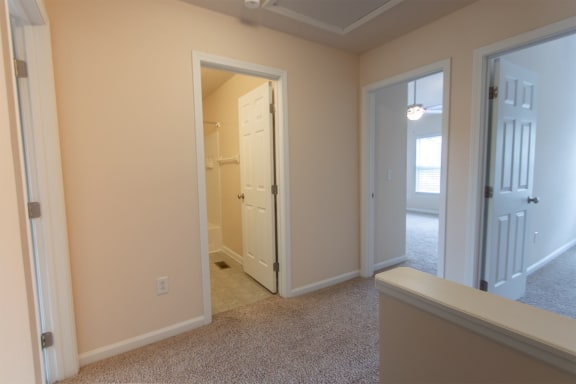 This is a photo of the second floor hallway in the 1578 square foot, 3 bedroom, 2 and 1/2 bath Flagship floor plan at Nantucket Apartments in Loveland, OH.